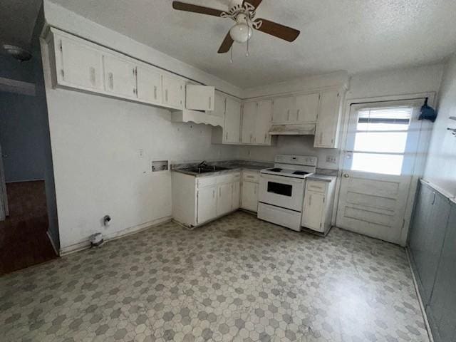 kitchen featuring white cabinetry, sink, ceiling fan, a textured ceiling, and electric stove