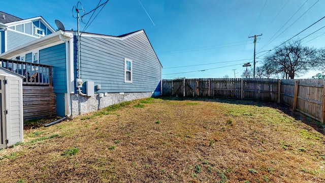 view of yard with a fenced backyard