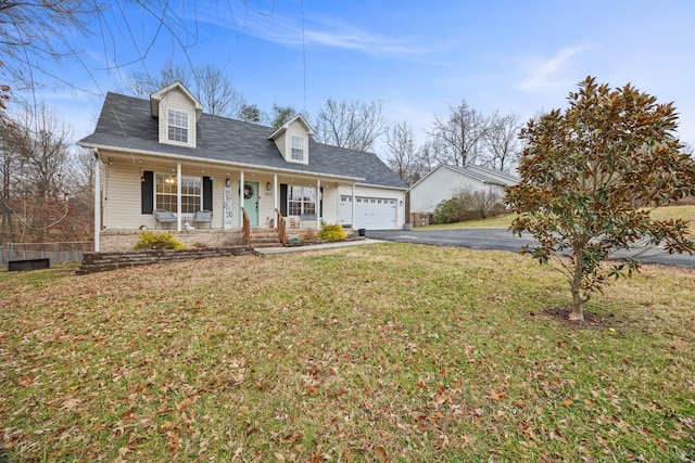 cape cod house featuring a garage, a front yard, and a porch