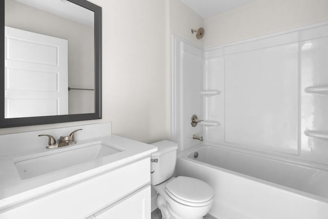 full bathroom featuring  shower combination, toilet, and vanity