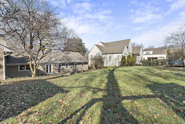 view of yard featuring a trampoline