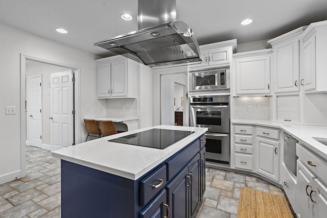 kitchen with island range hood, blue cabinets, white cabinets, a center island, and stainless steel appliances