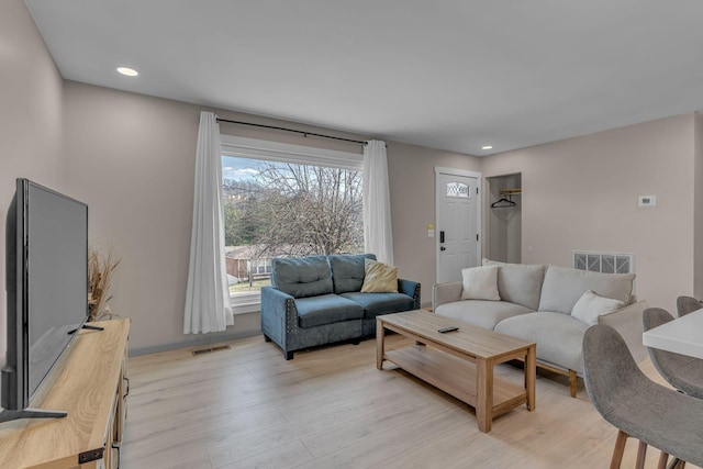 living room with light wood-type flooring