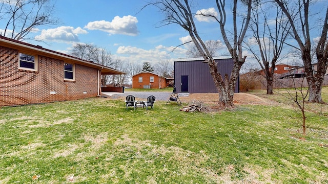 view of yard with gravel driveway