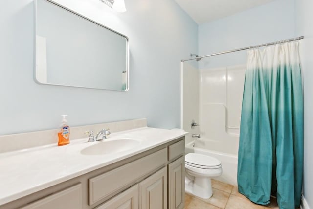 bathroom featuring tile patterned flooring, shower / bath combo with shower curtain, toilet, and vanity