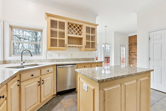 kitchen with light brown cabinets, light stone countertops, a sink, dishwasher, and crown molding