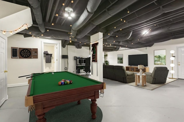 recreation room featuring finished concrete flooring and pool table