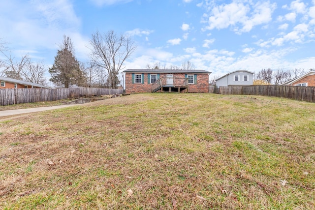 view of yard with a deck