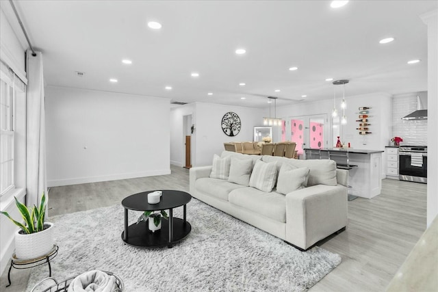 living room with light hardwood / wood-style flooring