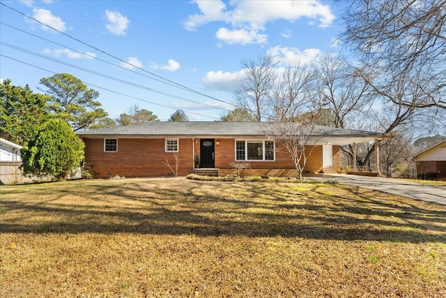 single story home featuring a front yard and a carport