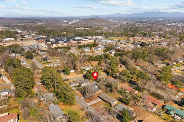 drone / aerial view featuring a mountain view