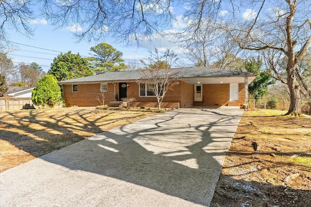 single story home with a carport