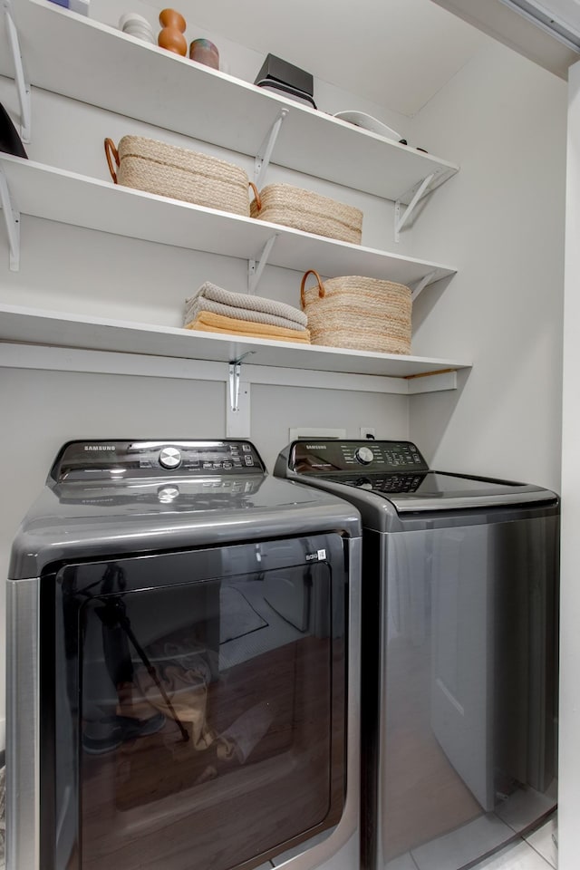 laundry room featuring washer and clothes dryer