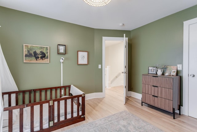 bedroom featuring light hardwood / wood-style floors