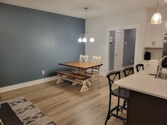 dining room featuring light hardwood / wood-style flooring