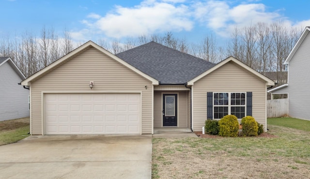 ranch-style house featuring a garage and a front yard