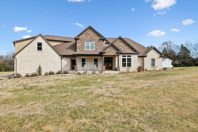 craftsman-style house with a porch and a front yard