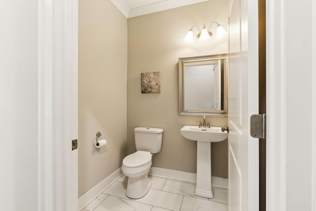 bathroom featuring sink and toilet