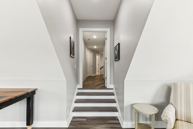 stairs with wood-type flooring