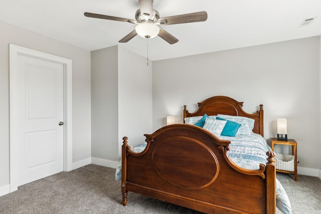 bedroom with ceiling fan and carpet floors