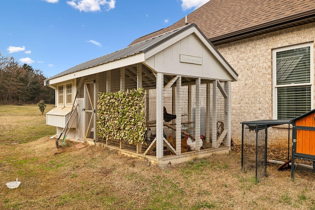 exterior space featuring a yard