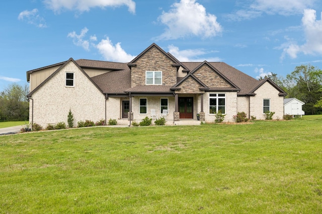 8760 Rocky Fork Rd, Smyrna, TN 37167 - view of front of home featuring a shingled roof, stone siding, and a front yard