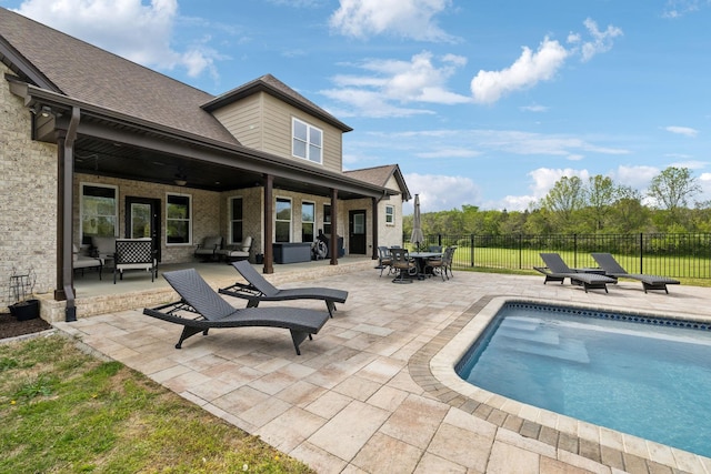 8760 Rocky Fork Rd, Smyrna, TN 37167 - view of swimming pool featuring fence, a ceiling fan, a patio, and outdoor dining area