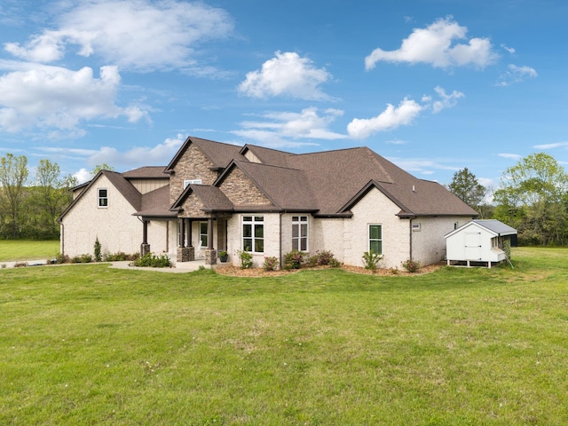 8760 Rocky Fork Rd, Smyrna, TN 37167 - view of front of home with a shingled roof, stone siding, and a front yard