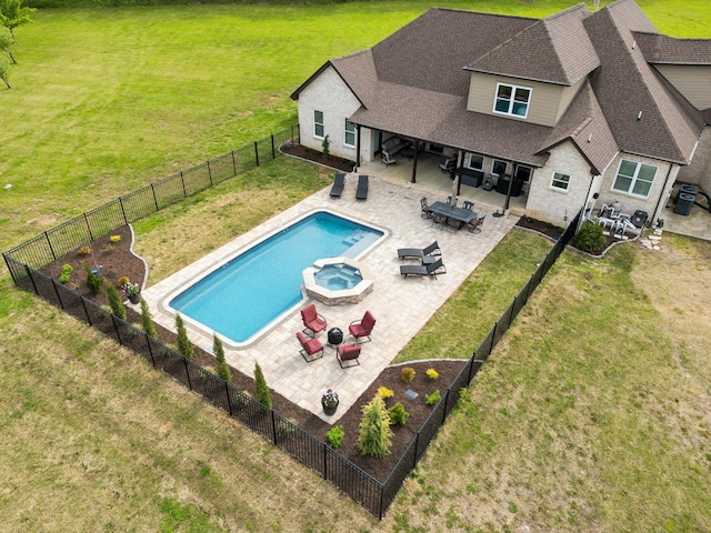 8760 Rocky Fork Rd, Smyrna, TN 37167 - view of pool with outdoor lounge area, a patio, a fenced backyard, a lawn, and a pool with connected hot tub