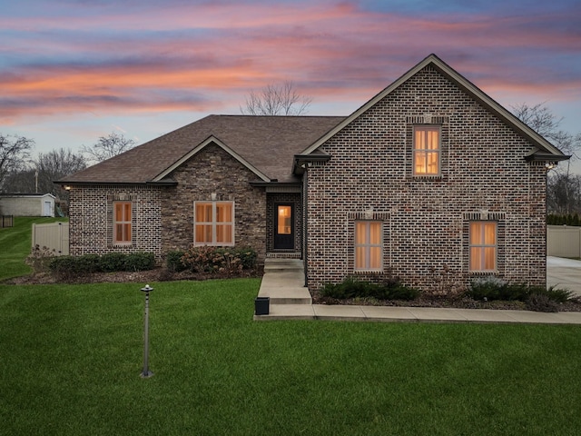 view of front of home featuring a yard