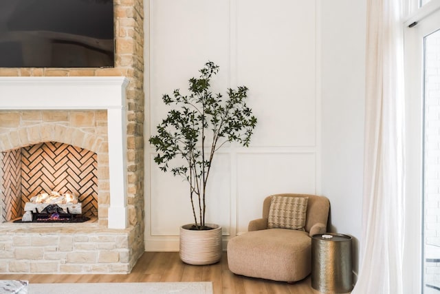 living area with hardwood / wood-style floors