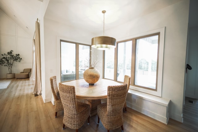 dining room with light hardwood / wood-style flooring