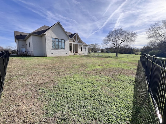 view of property exterior featuring a yard