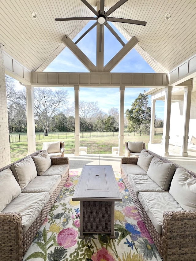 sunroom with vaulted ceiling and wooden ceiling