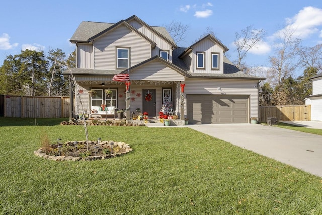 view of front of property featuring a garage, covered porch, and a front lawn