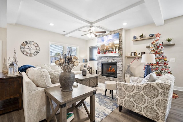 living room featuring a fireplace, wood-type flooring, and beam ceiling