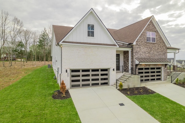 view of front of house with a garage and a front yard