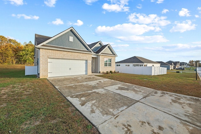 ranch-style house with a garage and a front yard