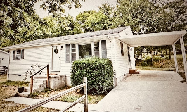 single story home with a carport