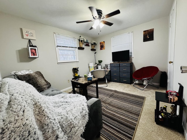 bedroom featuring ceiling fan and carpet floors