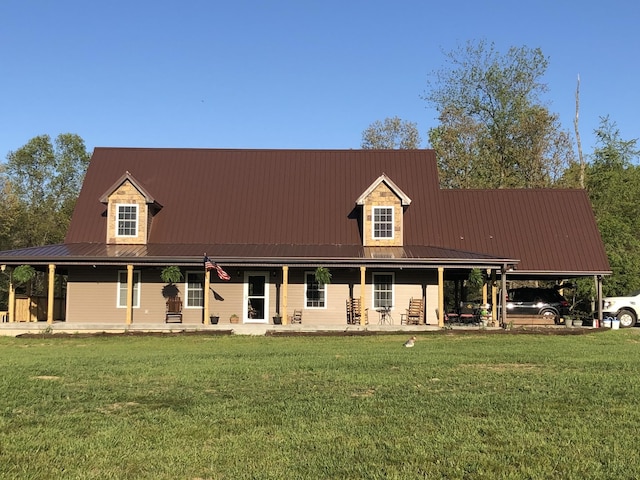 farmhouse with a porch, a carport, and a front yard