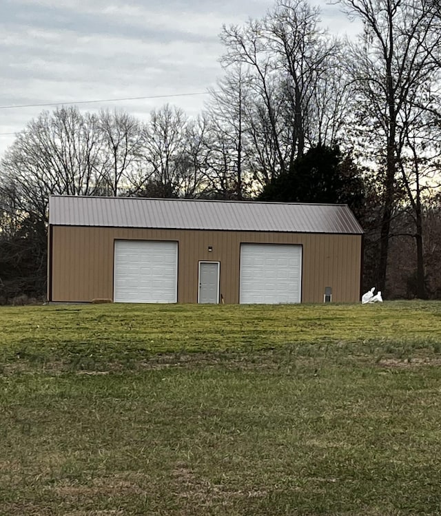 garage with a lawn