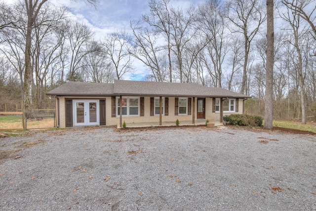 ranch-style house with french doors