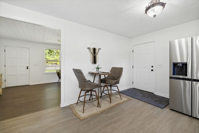 6992 Mill Creek Rd, Lyles, TN 37098 - dining space with wood finished floors and baseboards