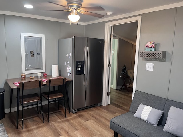 6992 Mill Creek Rd, Lyles, TN 37098 - kitchen with light wood finished floors, a ceiling fan, electric panel, and stainless steel fridge with ice dispenser