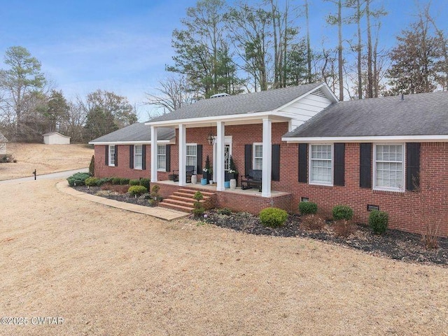 view of front of home featuring covered porch