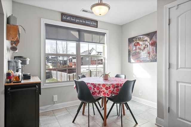 view of tiled dining space