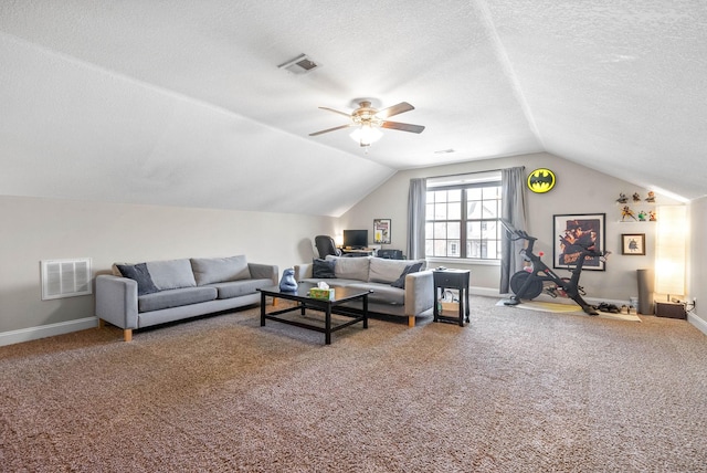 carpeted living room featuring lofted ceiling, ceiling fan, and a textured ceiling