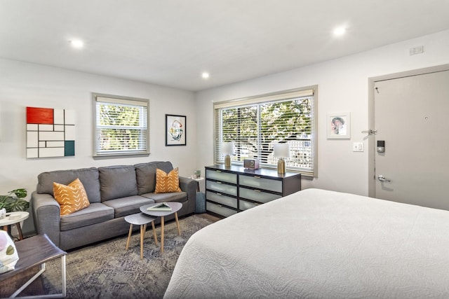 bedroom with multiple windows