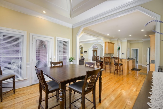 1416 Station Four Ln, Old Hickory, TN 37138 - dining space with decorative columns, crown molding, and light hardwood / wood-style floors